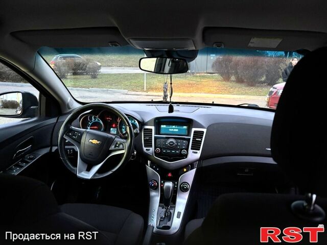 Черный Шевроле Круз, объемом двигателя 1.8 л и пробегом 173 тыс. км за 6700 $, фото 11 на Automoto.ua