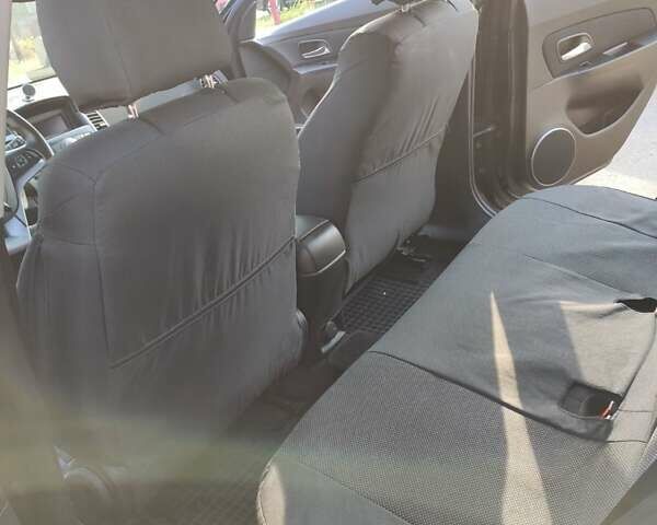 Черный Шевроле Круз, объемом двигателя 1.8 л и пробегом 140 тыс. км за 7000 $, фото 3 на Automoto.ua