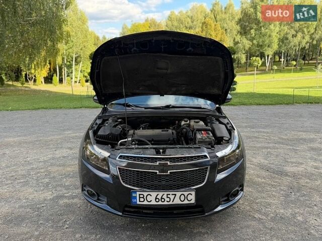 Черный Шевроле Круз, объемом двигателя 1.8 л и пробегом 190 тыс. км за 5300 $, фото 9 на Automoto.ua