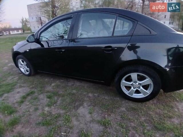 Черный Шевроле Круз, объемом двигателя 1.6 л и пробегом 207 тыс. км за 5800 $, фото 9 на Automoto.ua