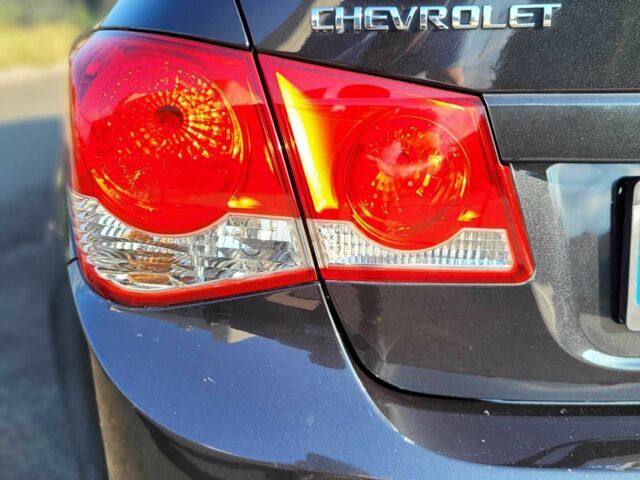 Чорний Шевроле Круз, об'ємом двигуна 1.6 л та пробігом 220 тис. км за 5200 $, фото 4 на Automoto.ua