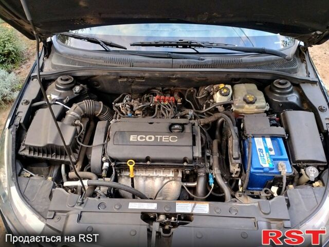 Черный Шевроле Круз, объемом двигателя 1.6 л и пробегом 190 тыс. км за 5800 $, фото 7 на Automoto.ua