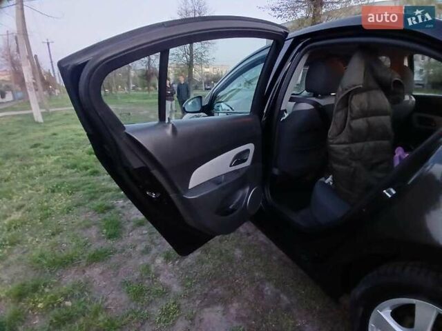 Черный Шевроле Круз, объемом двигателя 1.6 л и пробегом 207 тыс. км за 5800 $, фото 11 на Automoto.ua