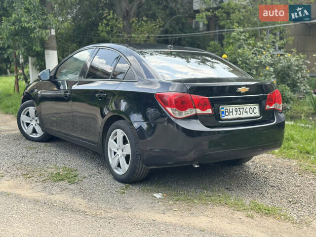Черный Шевроле Круз, объемом двигателя 1.8 л и пробегом 144 тыс. км за 5999 $, фото 2 на Automoto.ua