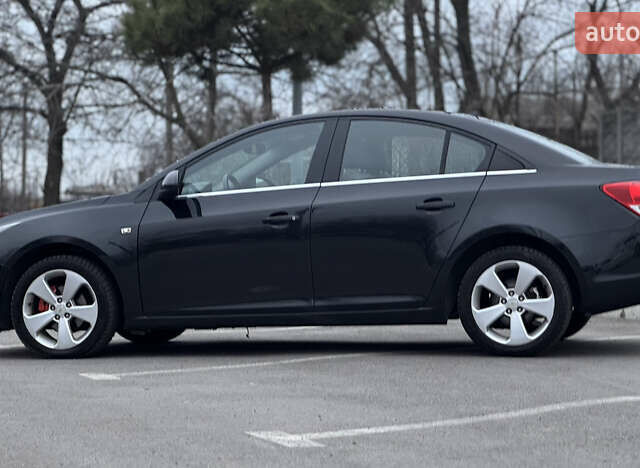 Черный Шевроле Круз, объемом двигателя 1.8 л и пробегом 232 тыс. км за 6999 $, фото 14 на Automoto.ua