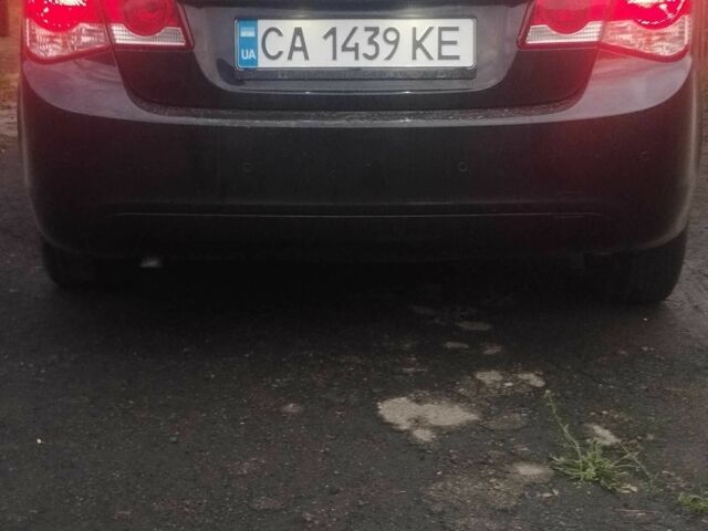 Черный Шевроле Круз, объемом двигателя 1.6 л и пробегом 258 тыс. км за 7200 $, фото 2 на Automoto.ua