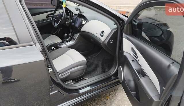 Черный Шевроле Круз, объемом двигателя 1.8 л и пробегом 220 тыс. км за 6600 $, фото 1 на Automoto.ua