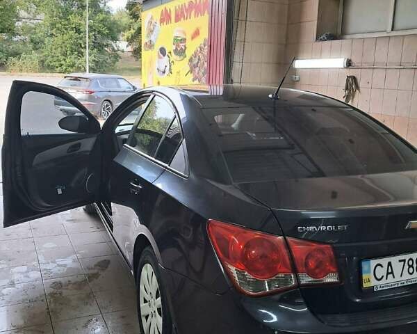 Чорний Шевроле Круз, об'ємом двигуна 1.6 л та пробігом 220 тис. км за 6780 $, фото 2 на Automoto.ua
