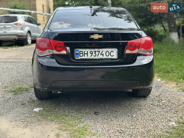 Черный Шевроле Круз, объемом двигателя 1.8 л и пробегом 144 тыс. км за 5999 $, фото 3 на Automoto.ua