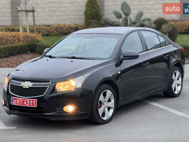 Черный Шевроле Круз, объемом двигателя 1.8 л и пробегом 232 тыс. км за 6999 $, фото 1 на Automoto.ua