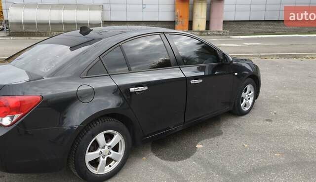 Черный Шевроле Круз, объемом двигателя 1.8 л и пробегом 220 тыс. км за 6600 $, фото 6 на Automoto.ua