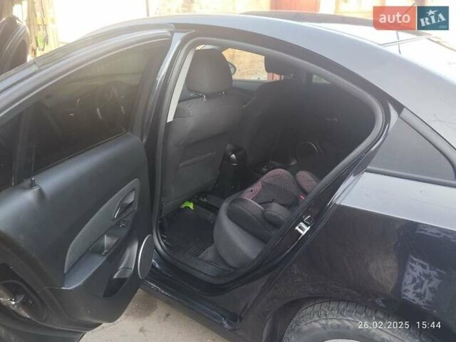 Черный Шевроле Круз, объемом двигателя 1.8 л и пробегом 189 тыс. км за 6700 $, фото 1 на Automoto.ua