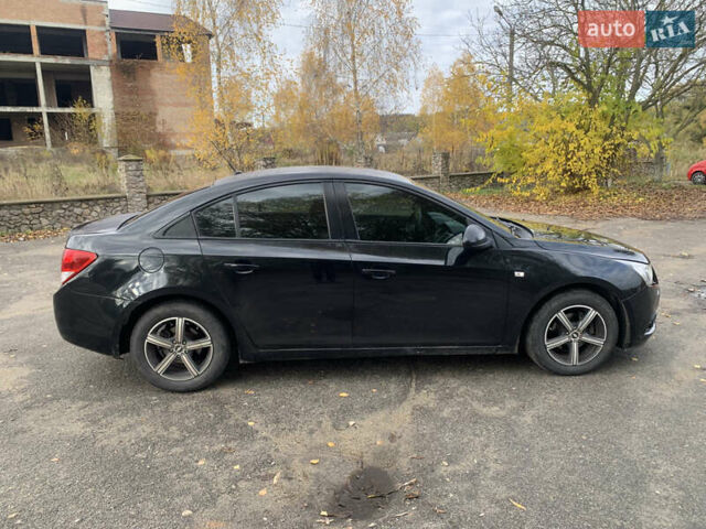 Черный Шевроле Круз, объемом двигателя 1.8 л и пробегом 195 тыс. км за 6200 $, фото 8 на Automoto.ua