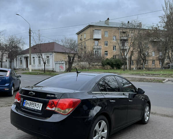 Черный Шевроле Круз, объемом двигателя 1.8 л и пробегом 226 тыс. км за 7700 $, фото 7 на Automoto.ua