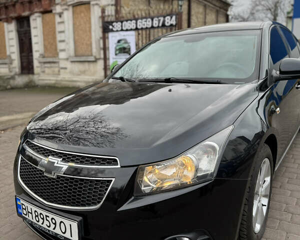 Черный Шевроле Круз, объемом двигателя 1.8 л и пробегом 226 тыс. км за 7700 $, фото 4 на Automoto.ua