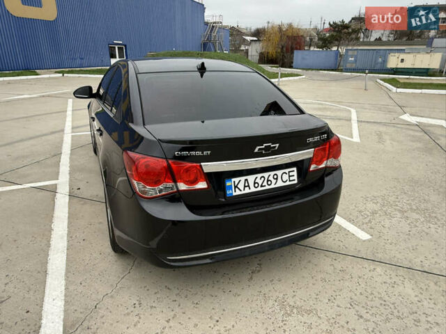 Черный Шевроле Круз, объемом двигателя 1.8 л и пробегом 141 тыс. км за 7700 $, фото 2 на Automoto.ua