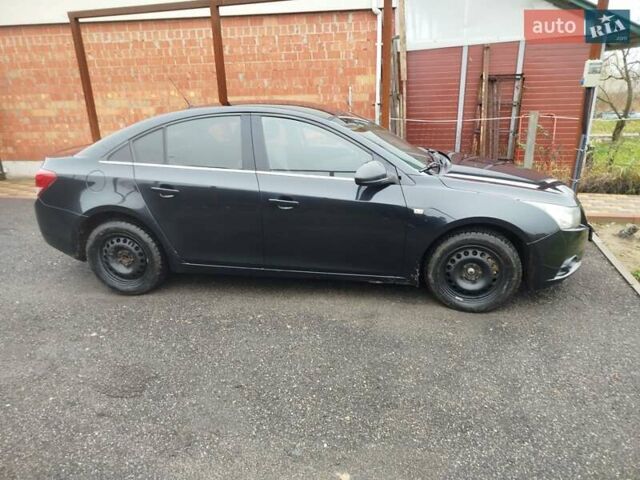Черный Шевроле Круз, объемом двигателя 2 л и пробегом 252 тыс. км за 6200 $, фото 1 на Automoto.ua