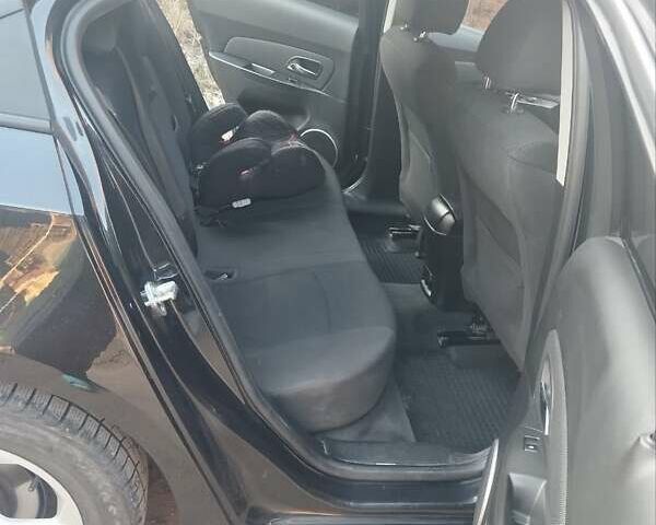 Черный Шевроле Круз, объемом двигателя 1.8 л и пробегом 189 тыс. км за 6700 $, фото 6 на Automoto.ua