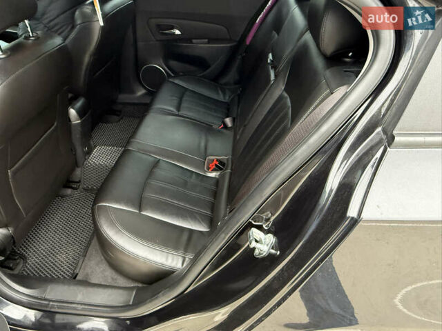 Черный Шевроле Круз, объемом двигателя 1.8 л и пробегом 141 тыс. км за 7700 $, фото 7 на Automoto.ua