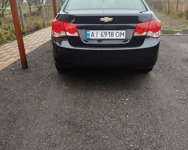 Черный Шевроле Круз, объемом двигателя 2 л и пробегом 252 тыс. км за 6200 $, фото 2 на Automoto.ua