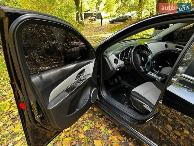 Черный Шевроле Круз, объемом двигателя 1.8 л и пробегом 177 тыс. км за 6400 $, фото 8 на Automoto.ua