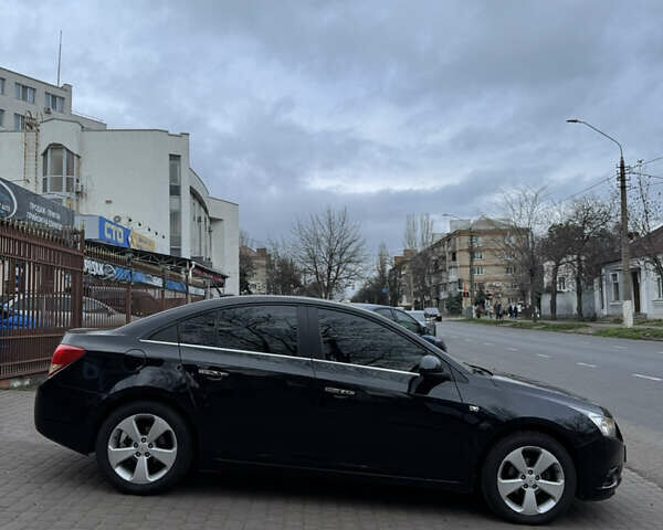 Черный Шевроле Круз, объемом двигателя 1.8 л и пробегом 226 тыс. км за 7700 $, фото 8 на Automoto.ua