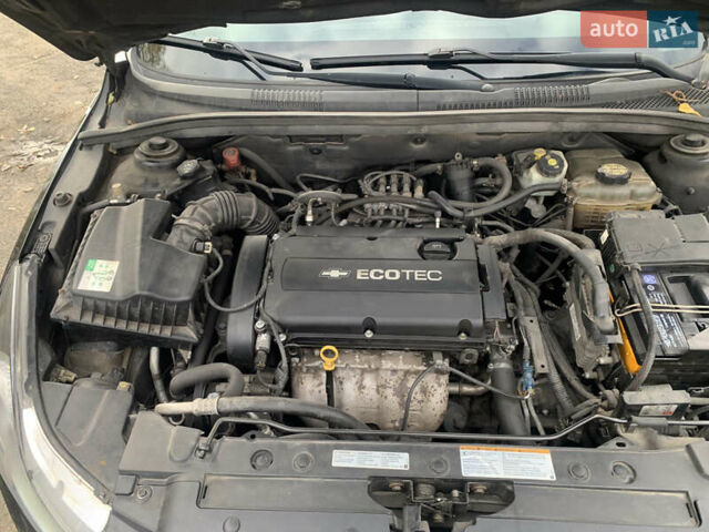 Черный Шевроле Круз, объемом двигателя 1.8 л и пробегом 195 тыс. км за 6200 $, фото 11 на Automoto.ua