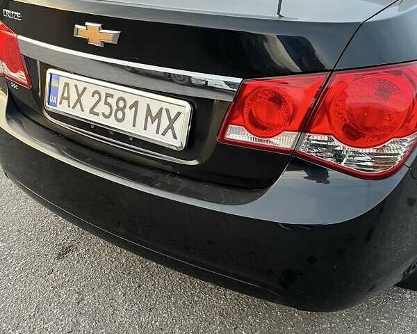 Чорний Шевроле Круз, об'ємом двигуна 1.8 л та пробігом 125 тис. км за 7000 $, фото 5 на Automoto.ua