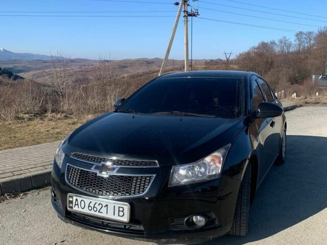 Черный Шевроле Круз, объемом двигателя 1.8 л и пробегом 179 тыс. км за 5900 $, фото 1 на Automoto.ua