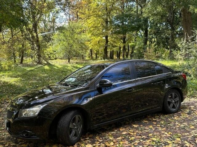 Черный Шевроле Круз, объемом двигателя 1.8 л и пробегом 177 тыс. км за 6400 $, фото 5 на Automoto.ua