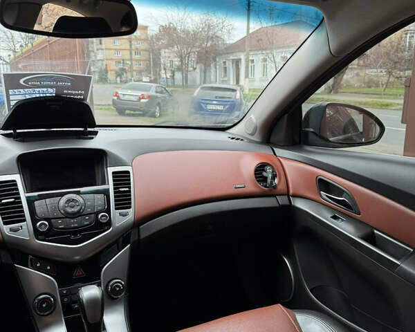 Черный Шевроле Круз, объемом двигателя 1.8 л и пробегом 226 тыс. км за 7700 $, фото 32 на Automoto.ua