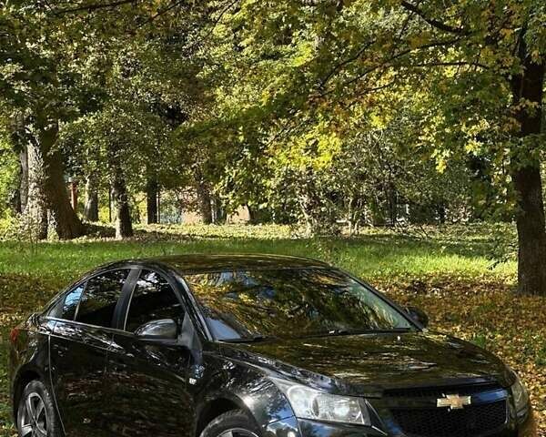 Черный Шевроле Круз, объемом двигателя 1.8 л и пробегом 177 тыс. км за 6400 $, фото 13 на Automoto.ua