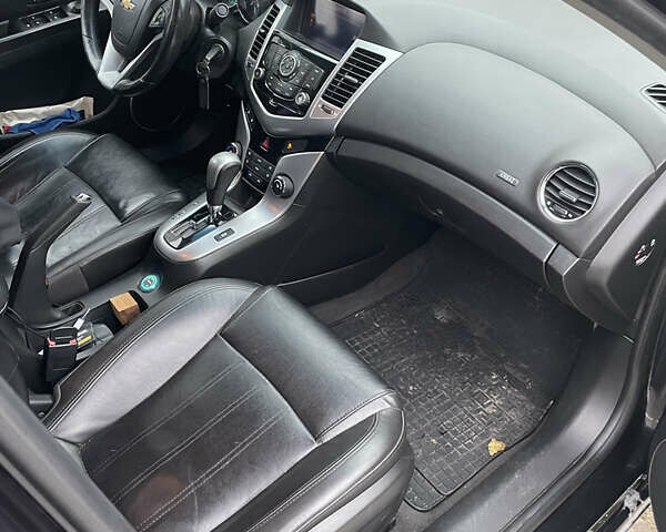 Черный Шевроле Круз, объемом двигателя 1.8 л и пробегом 215 тыс. км за 6700 $, фото 9 на Automoto.ua