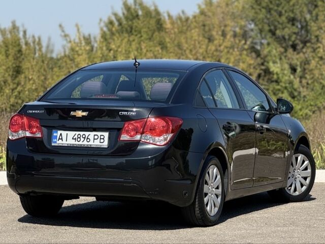 Черный Шевроле Круз, объемом двигателя 1.8 л и пробегом 169 тыс. км за 7500 $, фото 10 на Automoto.ua
