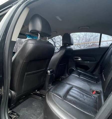 Черный Шевроле Круз, объемом двигателя 1.8 л и пробегом 233 тыс. км за 6000 $, фото 9 на Automoto.ua