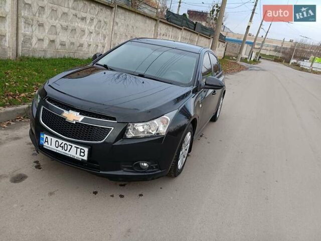 Черный Шевроле Круз, объемом двигателя 1.8 л и пробегом 177 тыс. км за 7200 $, фото 4 на Automoto.ua