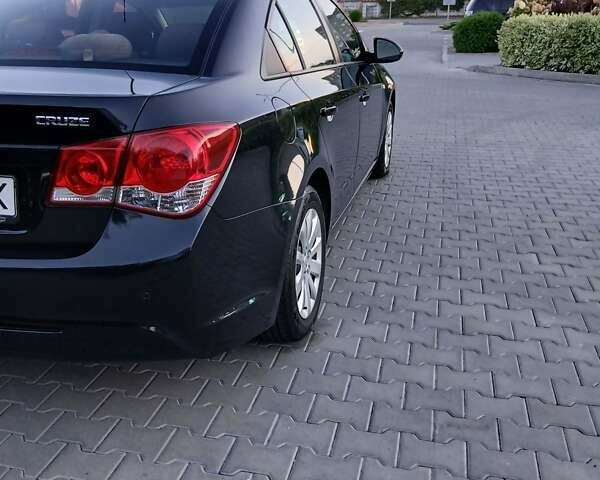 Чорний Шевроле Круз, об'ємом двигуна 1.8 л та пробігом 147 тис. км за 7650 $, фото 4 на Automoto.ua