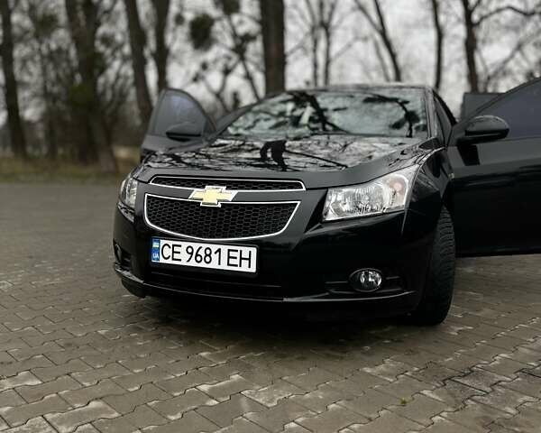 Черный Шевроле Круз, объемом двигателя 1.6 л и пробегом 117 тыс. км за 6999 $, фото 1 на Automoto.ua