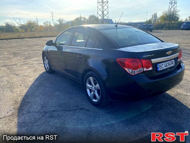 Черный Шевроле Круз, объемом двигателя 1.7 л и пробегом 221 тыс. км за 8000 $, фото 2 на Automoto.ua