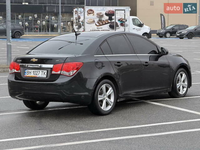 Черный Шевроле Круз, объемом двигателя 1.4 л и пробегом 243 тыс. км за 5800 $, фото 5 на Automoto.ua