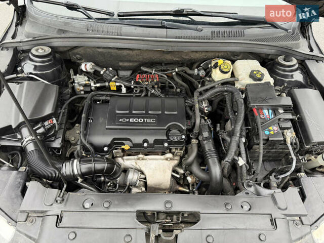 Черный Шевроле Круз, объемом двигателя 1.4 л и пробегом 243 тыс. км за 5800 $, фото 19 на Automoto.ua