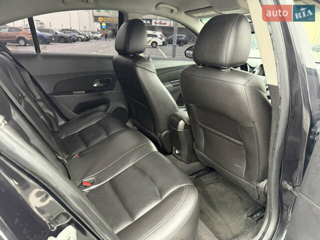 Черный Шевроле Круз, объемом двигателя 1.4 л и пробегом 243 тыс. км за 5800 $, фото 14 на Automoto.ua