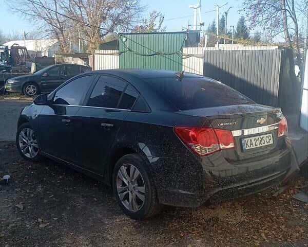 Черный Шевроле Круз, объемом двигателя 1.8 л и пробегом 195 тыс. км за 6500 $, фото 5 на Automoto.ua