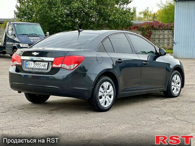 Черный Шевроле Круз, объемом двигателя 1.8 л и пробегом 235 тыс. км за 6000 $, фото 5 на Automoto.ua