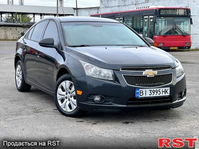 Черный Шевроле Круз, объемом двигателя 1.8 л и пробегом 235 тыс. км за 6000 $, фото 1 на Automoto.ua