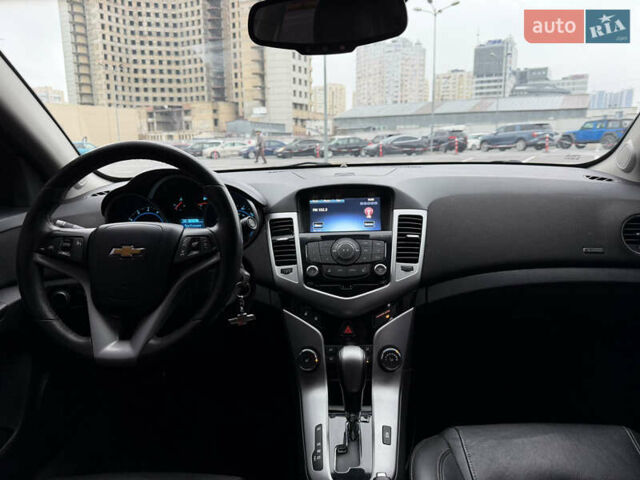 Черный Шевроле Круз, объемом двигателя 1.4 л и пробегом 243 тыс. км за 5800 $, фото 16 на Automoto.ua