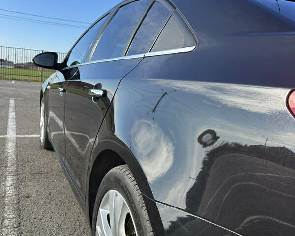 Черный Шевроле Круз, объемом двигателя 1.8 л и пробегом 123 тыс. км за 9600 $, фото 21 на Automoto.ua