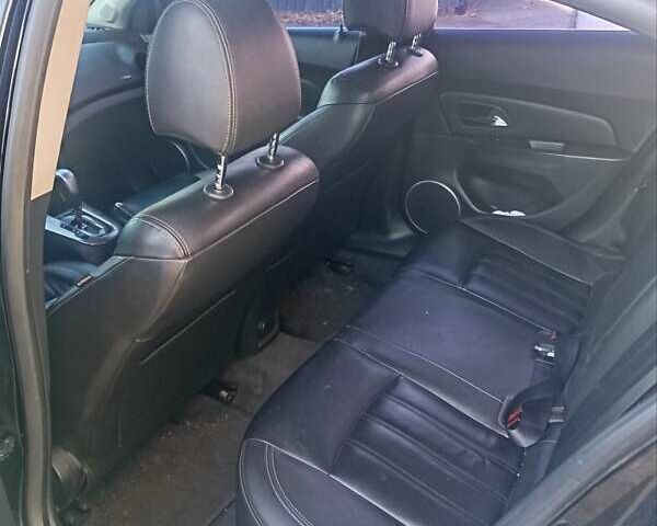 Черный Шевроле Круз, объемом двигателя 1.8 л и пробегом 195 тыс. км за 6500 $, фото 1 на Automoto.ua