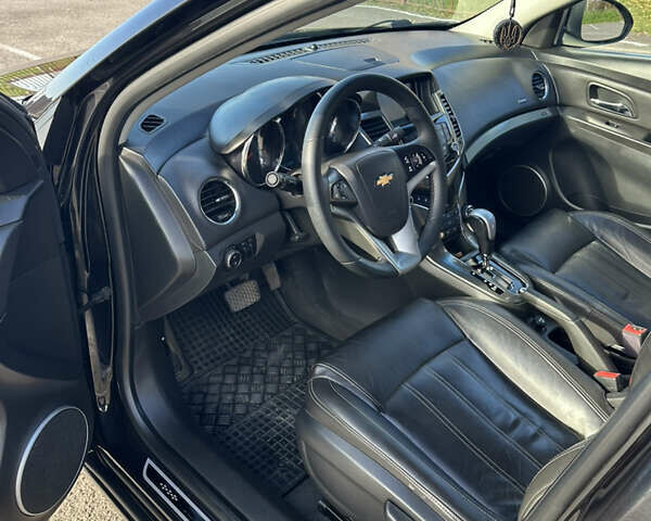 Черный Шевроле Круз, объемом двигателя 1.8 л и пробегом 123 тыс. км за 9600 $, фото 32 на Automoto.ua