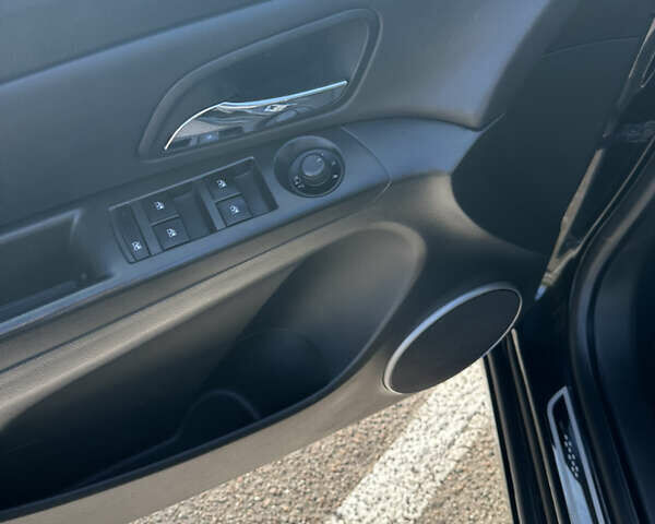 Черный Шевроле Круз, объемом двигателя 1.8 л и пробегом 123 тыс. км за 9600 $, фото 28 на Automoto.ua